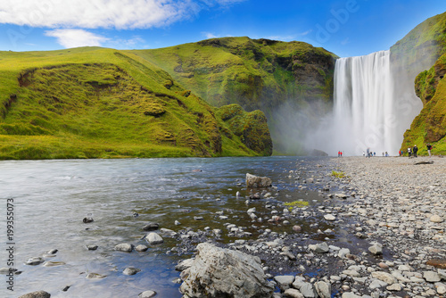 Skogafoss on aSunny Day. Skogafoss is a waterfall situated on the Skoga River in the south of Iceland at the cliffs of the former coastline.