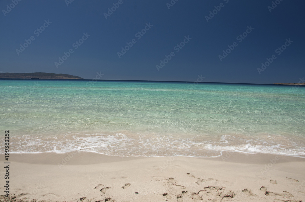 Fototapeta premium Crystal clear waters of exotic Simos beach at Elafonisos island in Greece