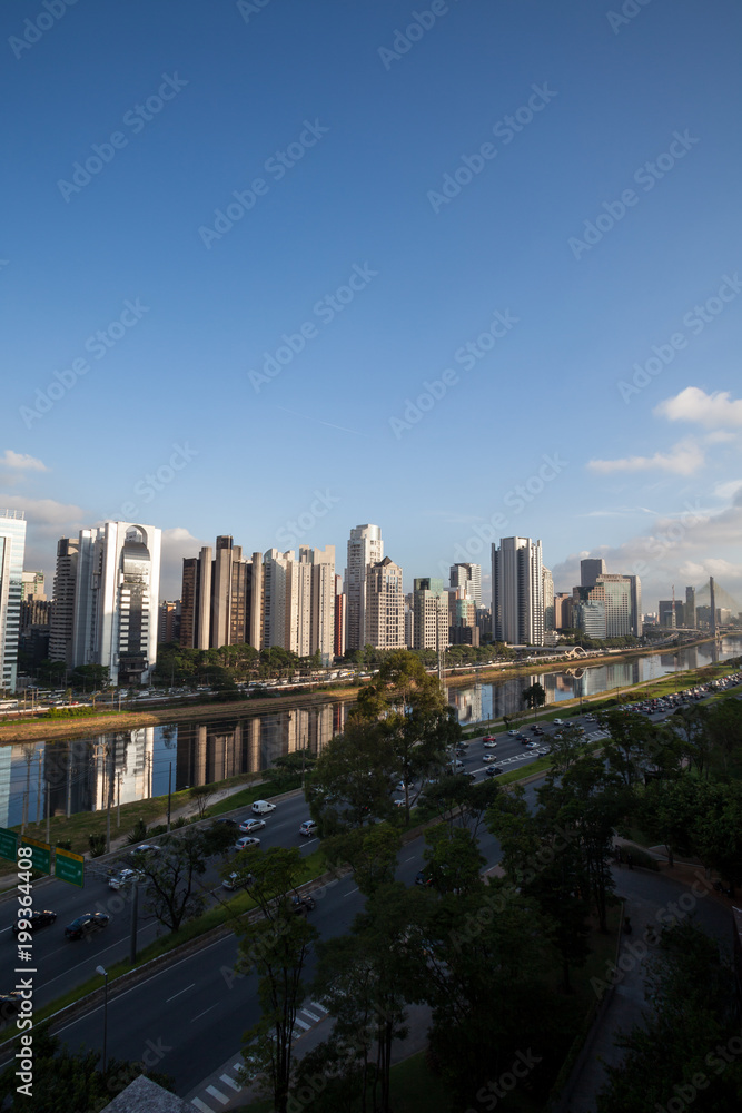 View of the Pinheiros River and corporate buildings in the city of Sao Paulo.