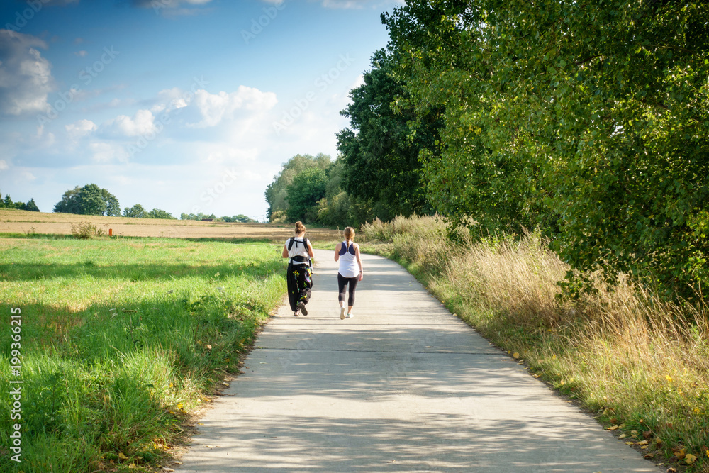 Naklejka premium Women jogging