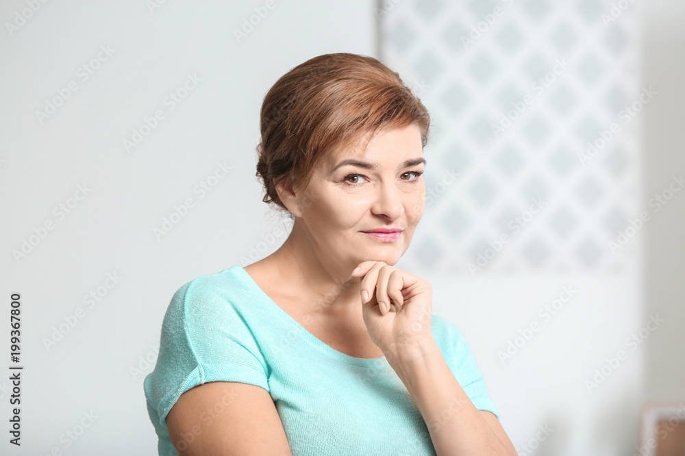 Portrait of beautiful mature woman at home Portrait of beautiful mature woman at home