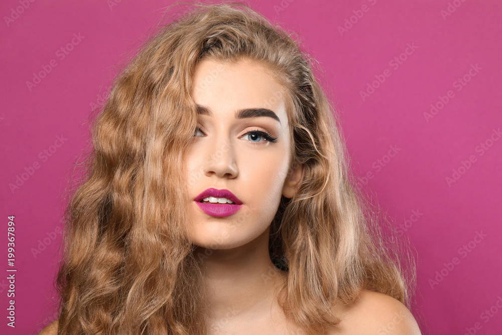 Young woman with beautiful eyebrows on color background Young woman with beautiful eyebrows on color background