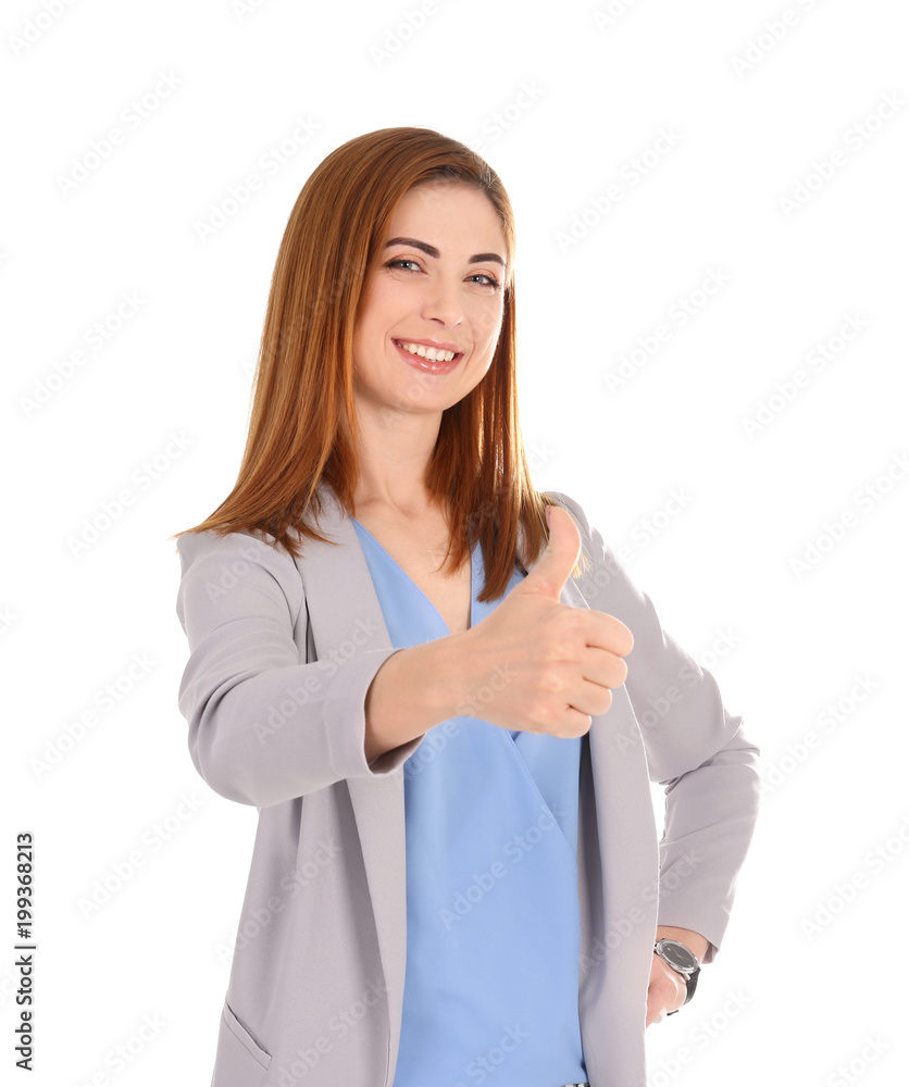 Beautiful young woman showing thumb up gesture on white background Beautiful young woman showing thumb up gesture on white background