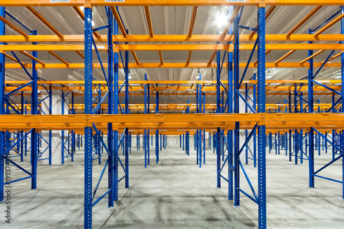 Empty shelves in distribution warehouse