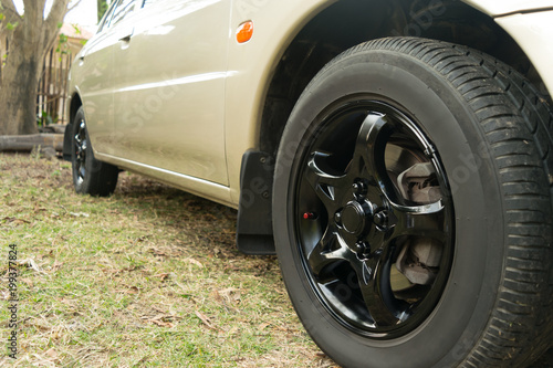 Wallpaper Mural Black car wheel in retro style background Torontodigital.ca
