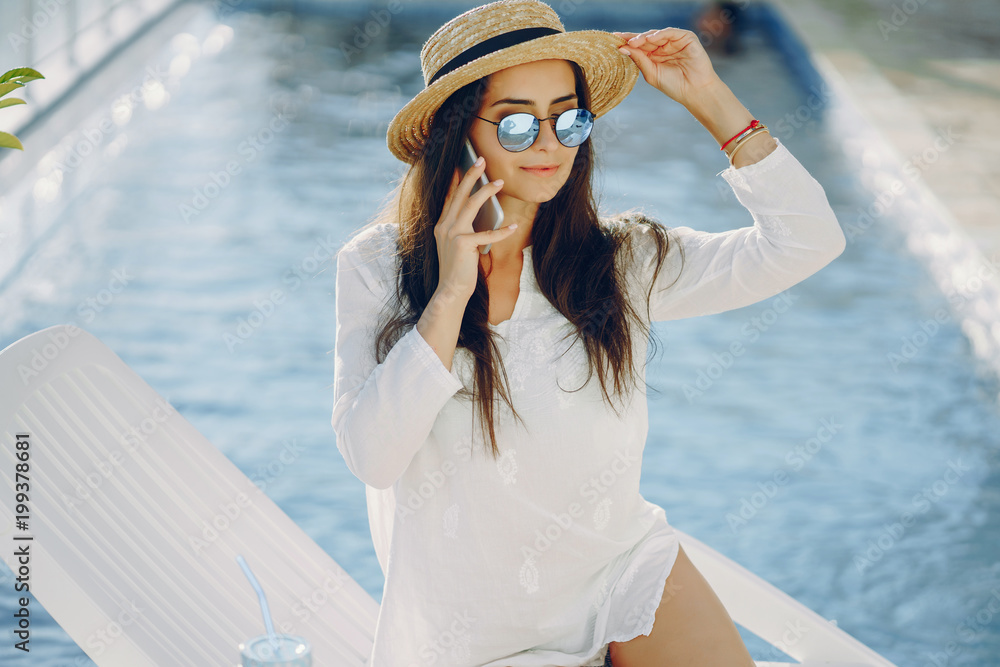 girl by the pool