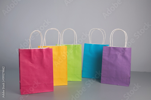 some colorful paper present bag