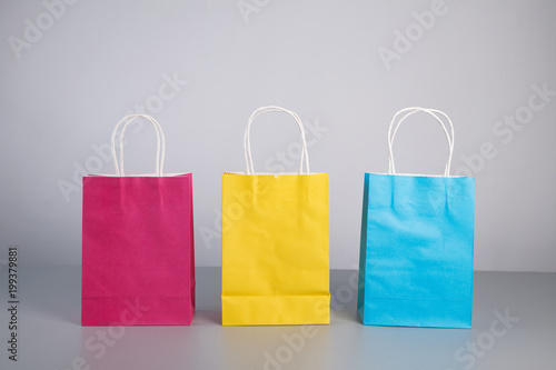 some colorful paper present bag