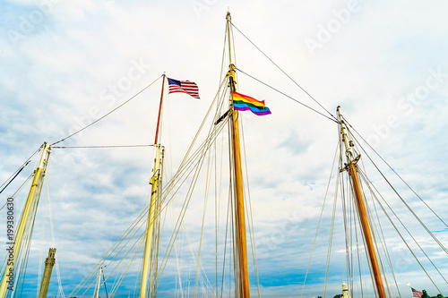 Two flags on yachts masts in Provincetown' marina, Massachusetts