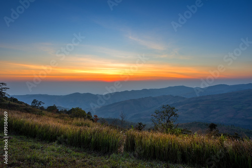Sunrise Morning at mountain range view on nature trail in Pho lom lo National Park Loei province, Thailand.