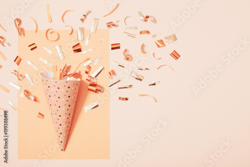 birthday hat with confetti on paper background Fototapeta