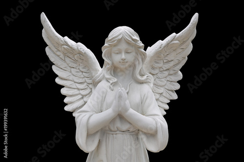 Angel statues isolated on black background. 
