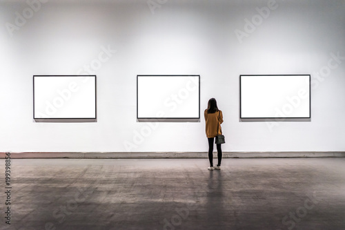 interior of gallery with blank frame photo
