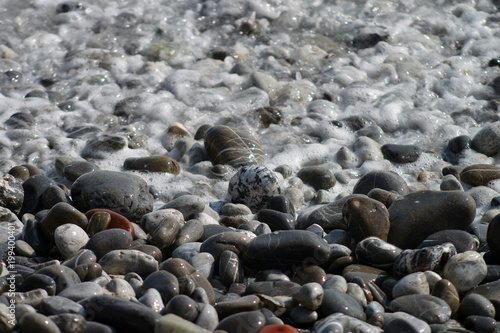 Beach  stone and water