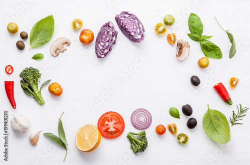 Fototapeta Naklejka Na Ścianę i Meble -  Various fresh vegetables and herbs on white background.Ingredients for cooking concept sweet basil ,tomato ,garlic ,pepper and onion with flat lay..