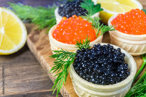 Festive sandwiches with red and black caviar. Healthy and tasty food.