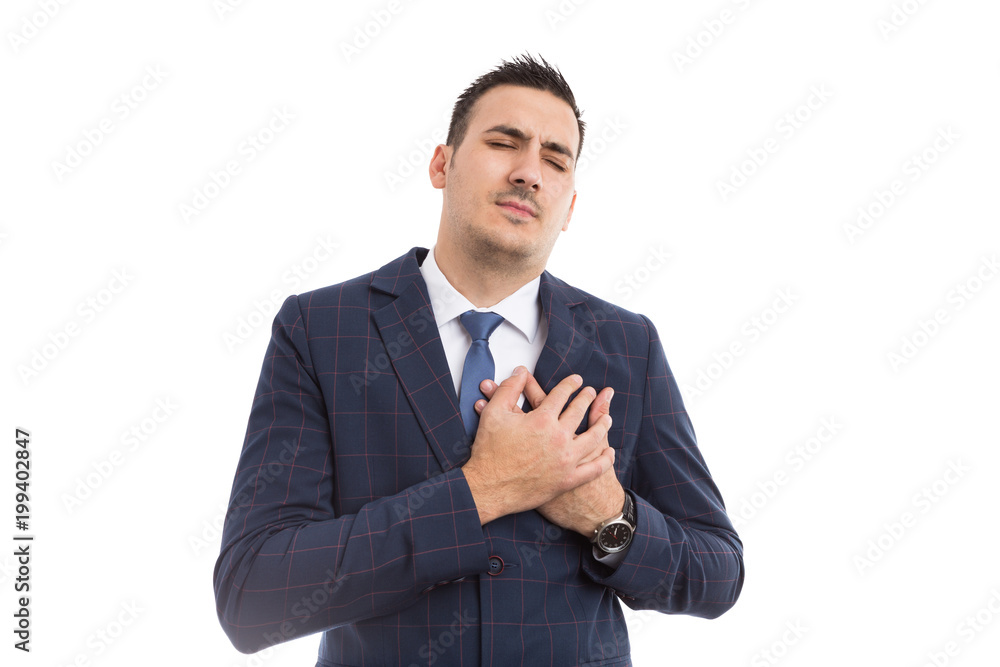 Businessman pressing chest as hearth attack concept.