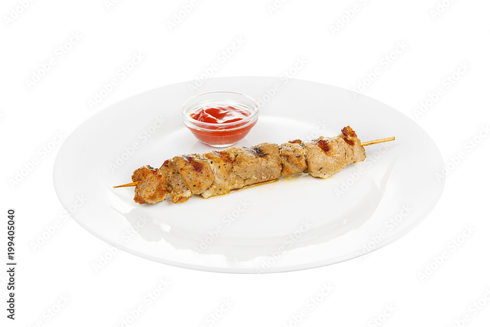 Shish kebab, beef, lamb, pork, chicken grilled meat, barbecue, without side dish on a plate, isolated on white background. Ketchup, tomato, red sauce. Side view For the menu Shish kebab, beef, lamb, pork, chicken grilled meat, barbecue, without side dish on a plate, isolated on white background. Ketchup, tomato, red sauce. Side view For the menu