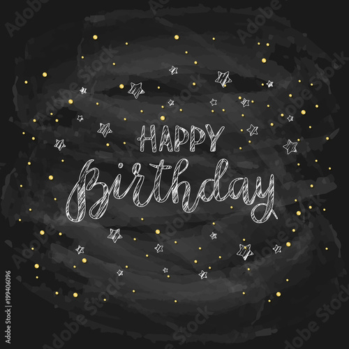 Text Happy Birthday on black chalkboard background