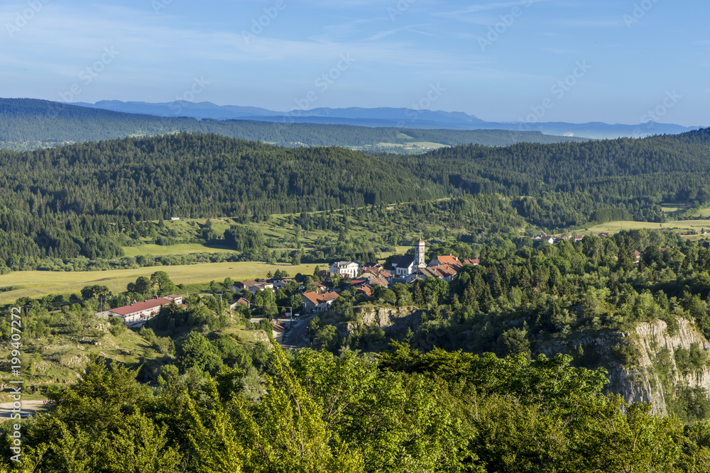 view to village la chaux du Dombief in french Jura region
