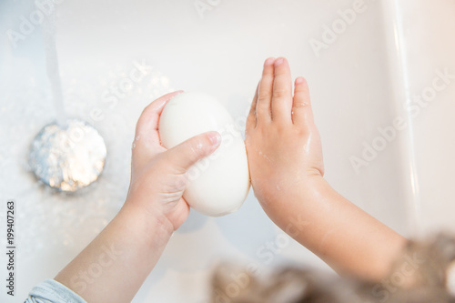 Child washig her hands