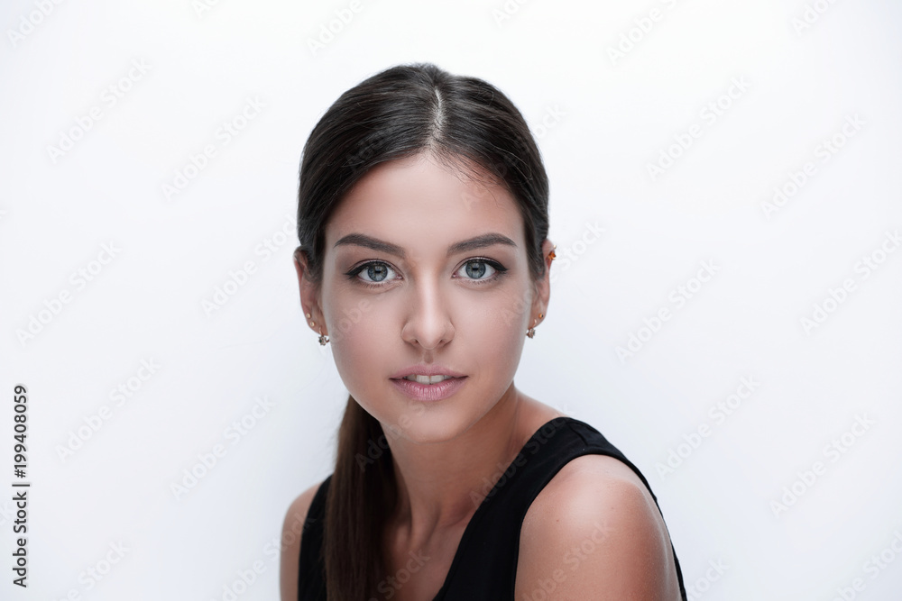 Portrait of a cute young woman. The concept of youth and skin care.