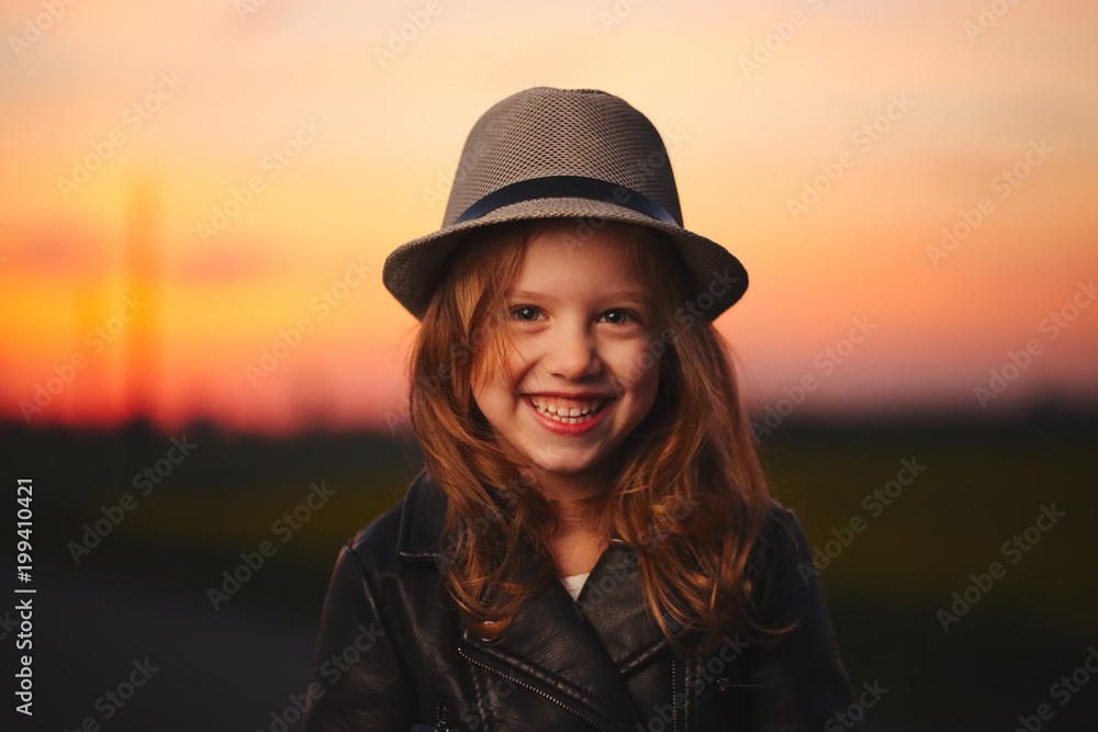 beautiful girl with hat on evening sunset beautiful girl with hat on evening sunset