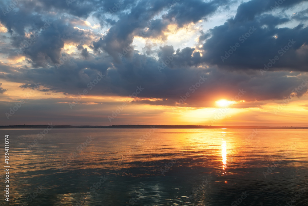 Obraz premium Beautiful fiery sunset sky on the beach. Composition of nature
