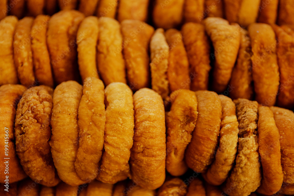 dried figs neatly laid out in a shop window top view dried figs neatly laid out in a shop window top view
