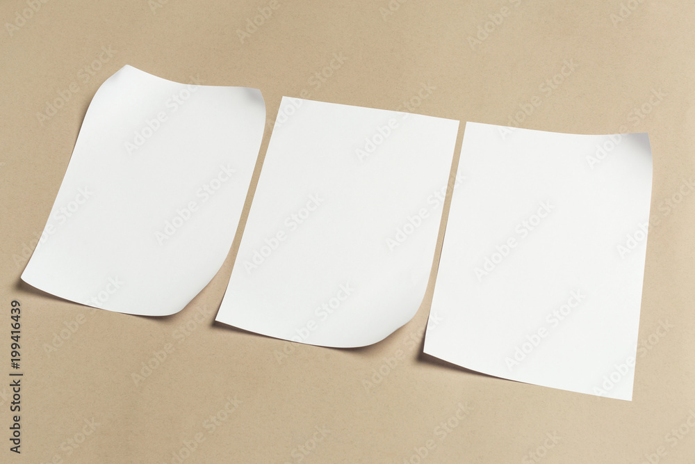 White business card on wooden table. Blank portrait A4. White business card on wooden table. Blank portrait A4.