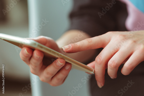 Woman typing write message on smart phone