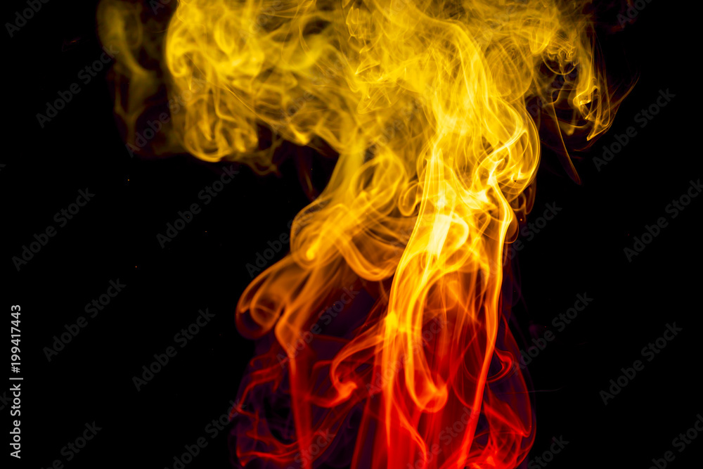 Fototapeta premium Colored smoke on black background