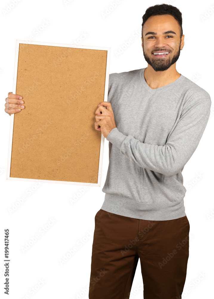 Portrait of a happy afro american man holding blank board isolated on a white background Portrait of a happy afro american man holding blank board isolated on a white background