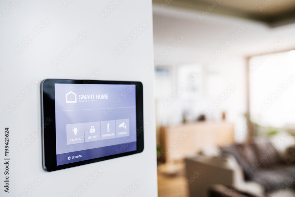 A tablet with smart home screen. A tablet with smart home screen.