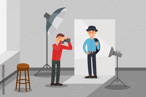 Male model in fashion clothes posing at photo session, photographer making photos, photo studio interior with professional equipment vector Illustration