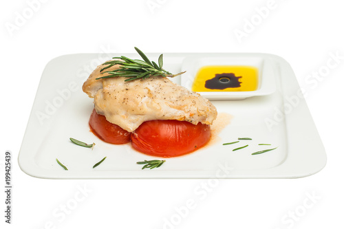 Chicken breast with tomato and rosemary herb isolated on white