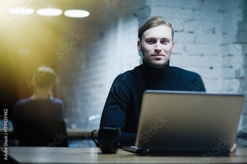 Young man with a laptop