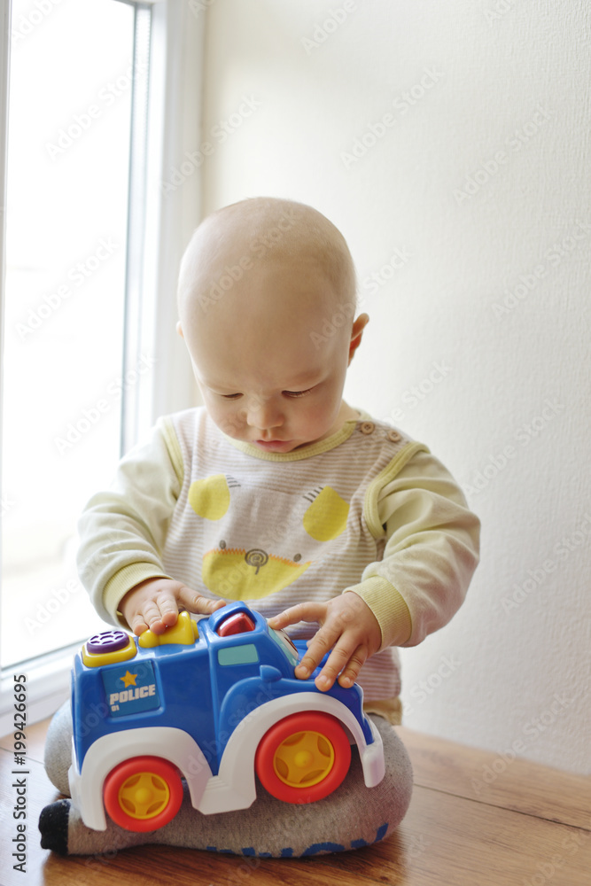 baby boy playing car