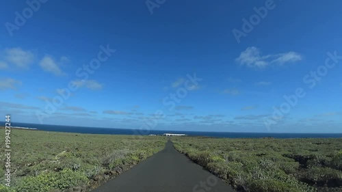 Car driving towards Jameos del Aguas in Cueva de los Verdes Lanzarote Spain