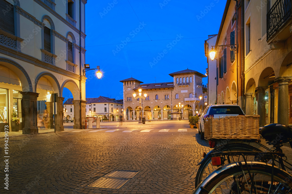 Fototapeta premium Montagnana, Italy - August 25, 2017: Night illumination of the main square of the commune.
