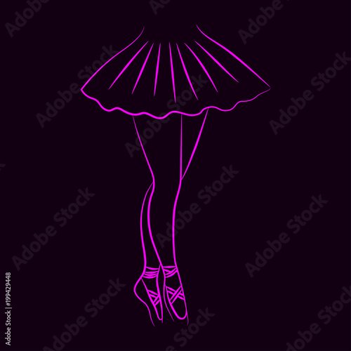 Slender ballerina feet on a dark background