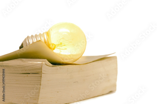 Old book with glowing light...