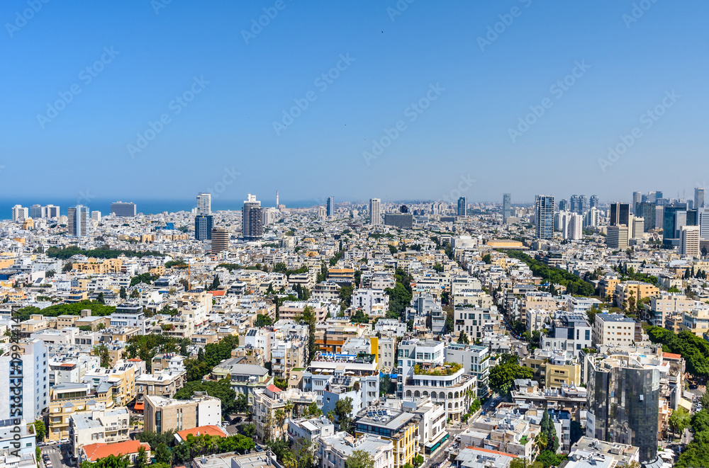  Rooftop view to Tel Aviv. Old houses and modern skyscrapers.
