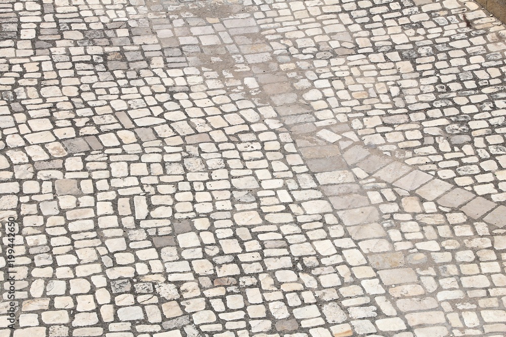 Limestone cobblestones street in Matera, Italy