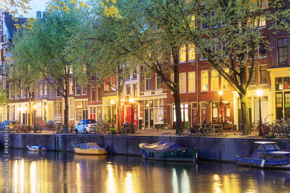 Canals of Amsterdam. Moody night view of red light district