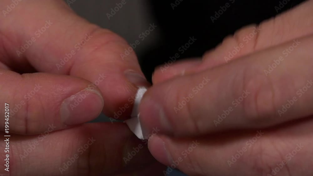 An artist makes origami in a living room - closeup An artist makes origami in a living room - closeup