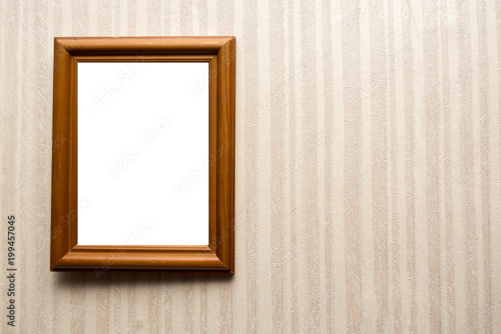 Wooden empty frame on wall with wallpaper in stripes. For your text Wooden empty frame on wall with wallpaper in stripes. For your text