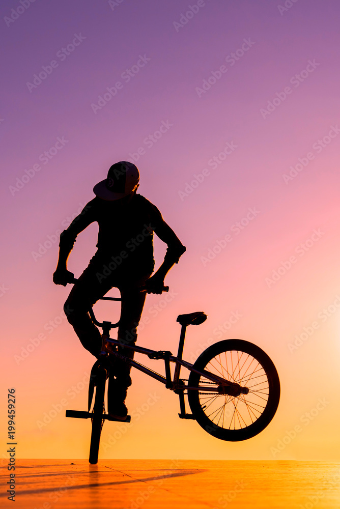 Fototapeta premium BMX rider at sunset