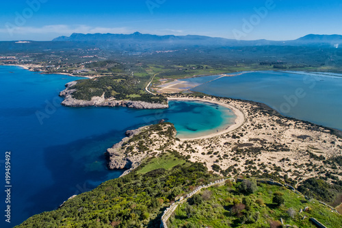 Panoramic aerial view of voidokilia beach, one of the best beaches in mediterranean Europe, beautiful lagoon of Voidokilia from a high point of view, Messinia, Greece © ververidis