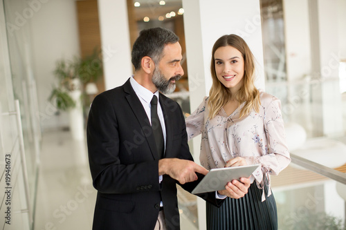 Business couple with digita...